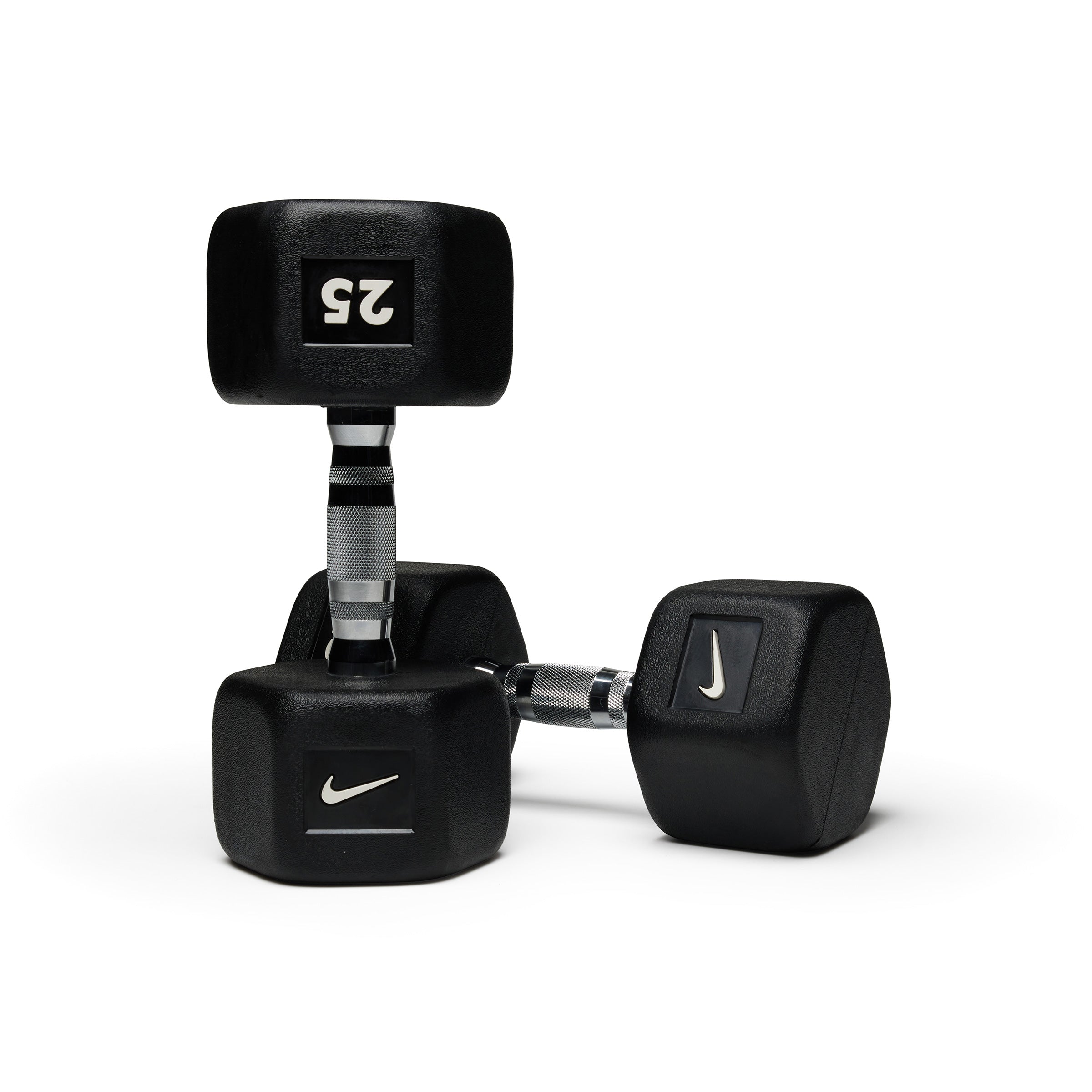 Various black hex dumbbells standing upright showing different weight options for progressive strength training.