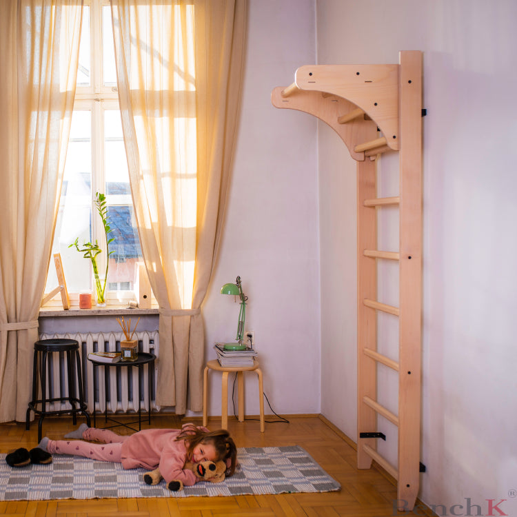Girl next to S1 100 Wall Bars