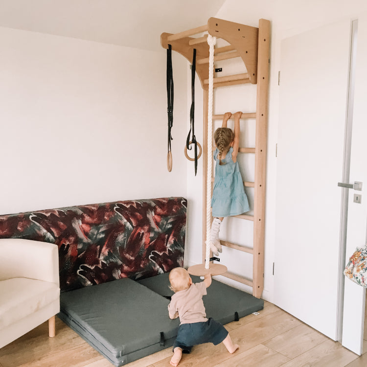 Kids on wall bars
