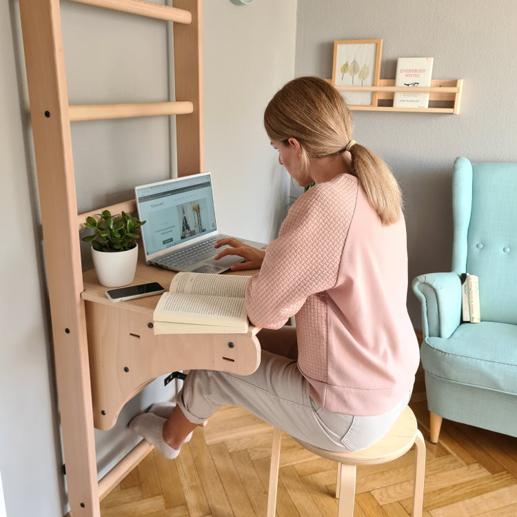 Woman using Wall Bars