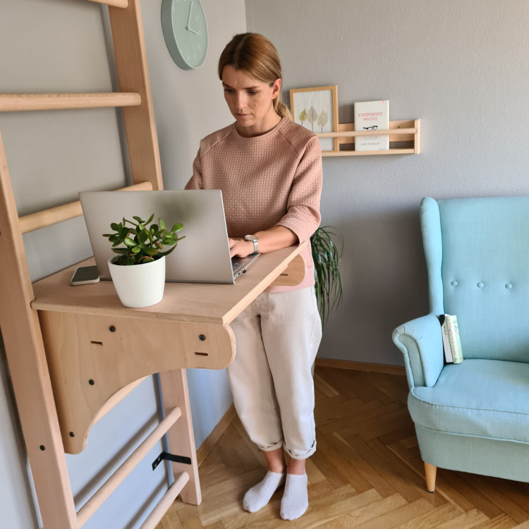 Woman using Wall Bars