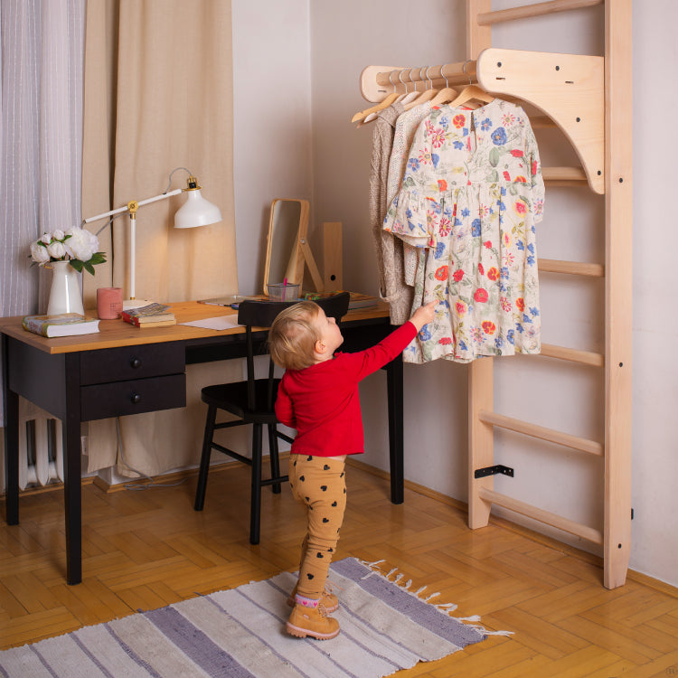 Kid using Wall Bars