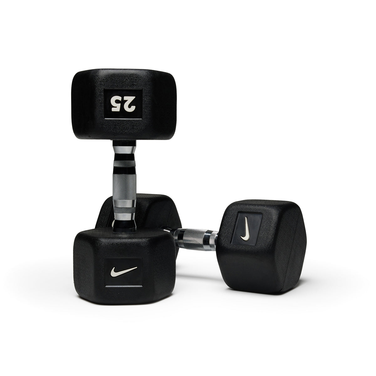 Various black hex dumbbells standing upright showing different weight options for progressive strength training.